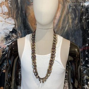 Very unique African inspired brass and leather necklace. Heavy and masculine